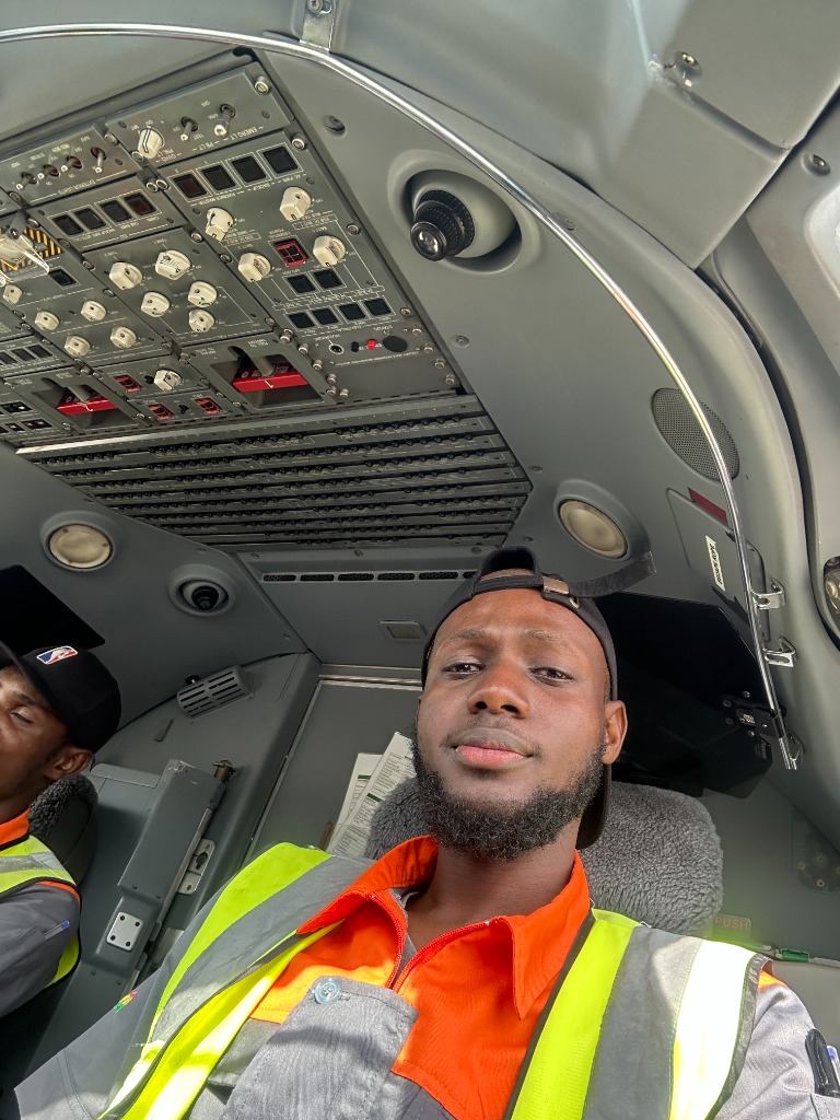 Yoofi Annan in aircraft cockpit at Africa World Airlines